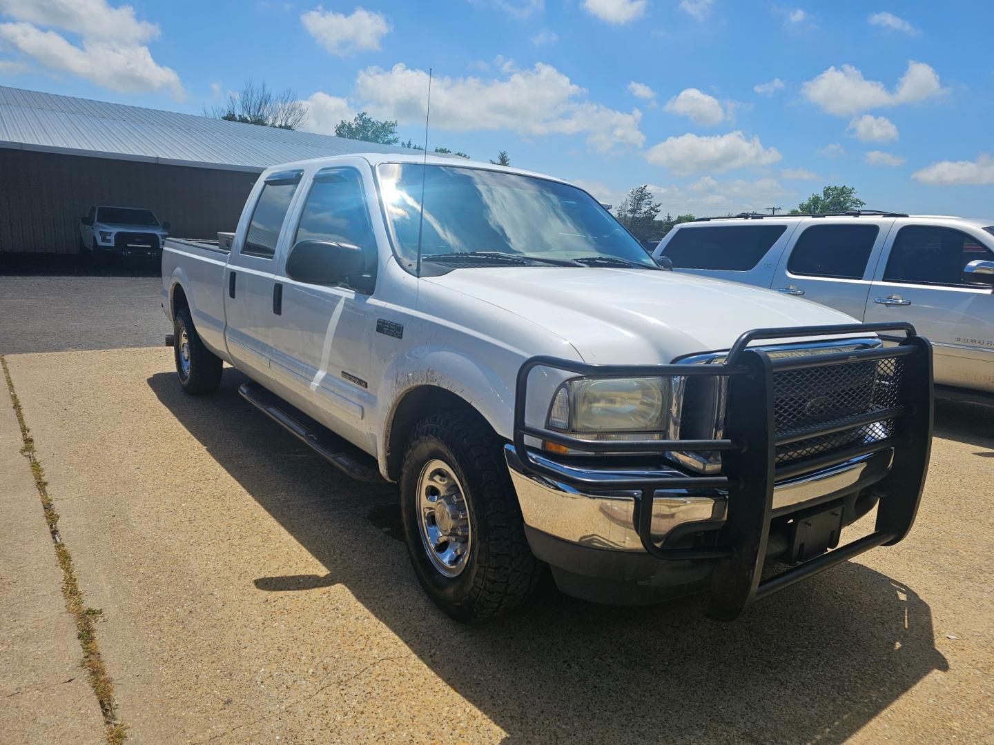 2003 WHITE FORD F-350 SD King Ranch Crew Cab Long Bed 2WD (1FTSW30F73E) with an 7.3L V8 OHV 16V TURBO DIESEL engine, 4-SPEED AUTOMATIC transmission, located at 533 S Seven Points BLVD, Seven Points, TX, 75143, (430) 255-4030, 32.313999, -96.209351 - Photo#1